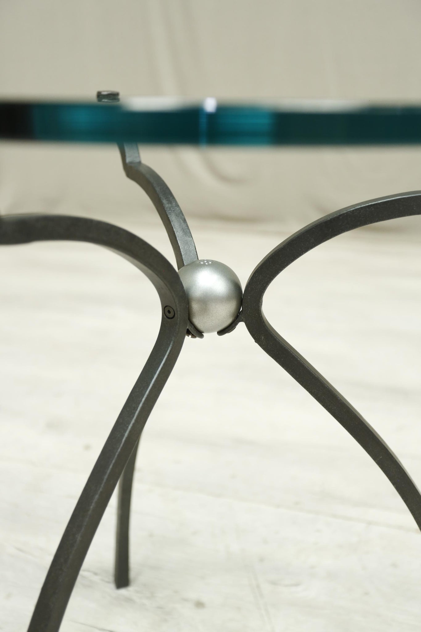Mid 20th century glass and iron side table by Peter Ghyczy