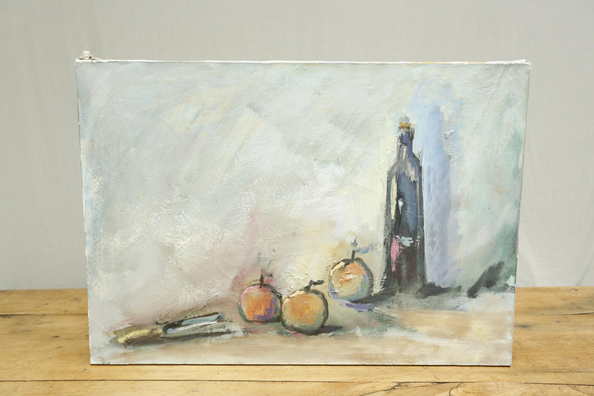20th century oil on canvas still life, fruit and bottle