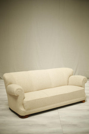 Large mid century Danish sofa upholstered in Boucle fabric - TallBoy Interiors