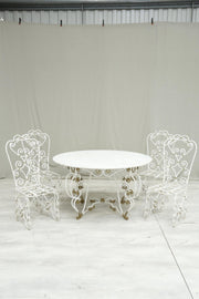 Antique white marble circular garden table and chairs - TallBoy Interiors