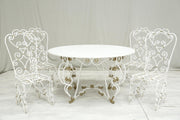 Antique white marble circular garden table and chairs - TallBoy Interiors