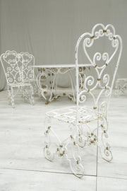 Antique white marble circular garden table and chairs - TallBoy Interiors