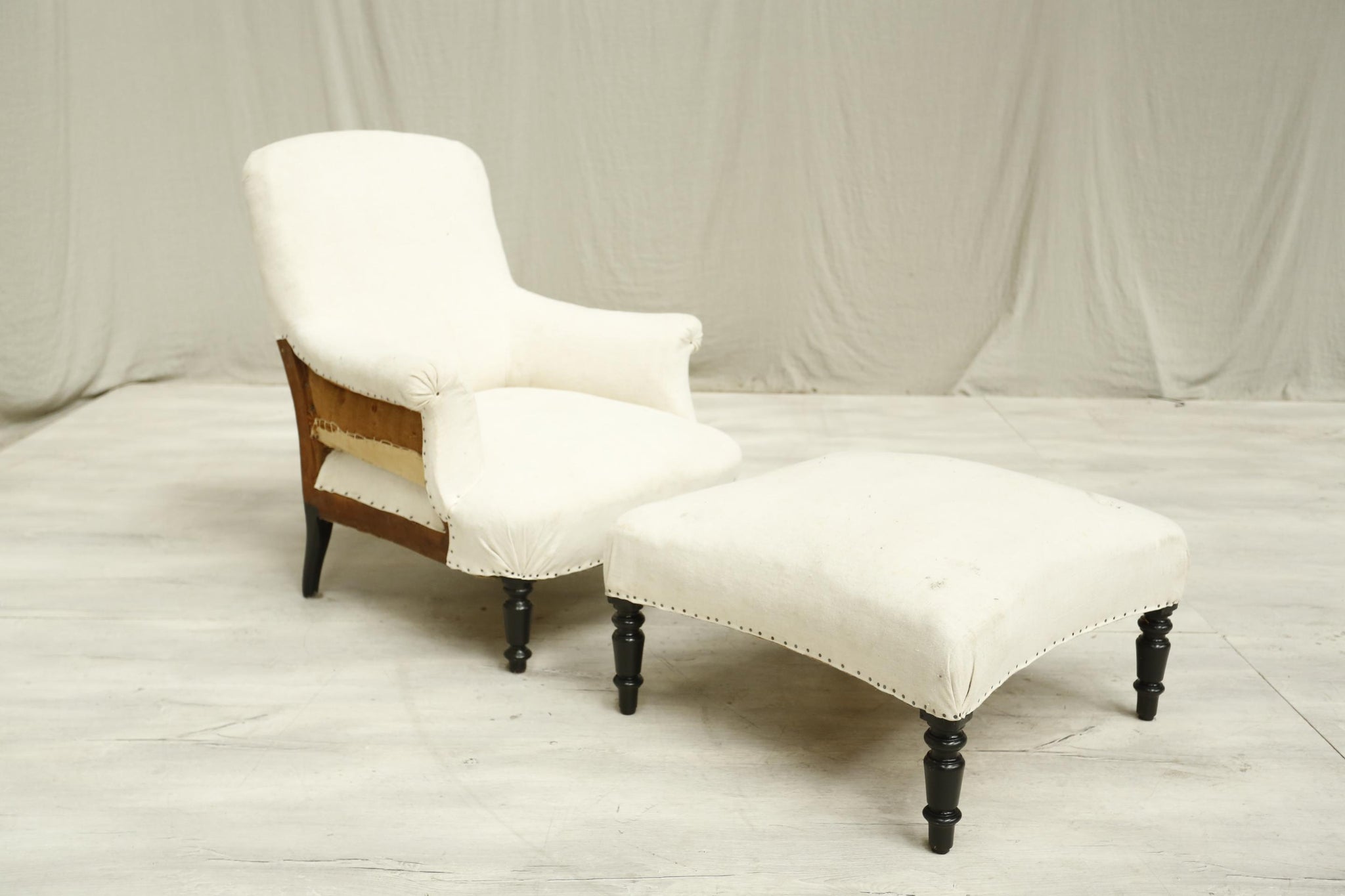 Antique French Napoleon square backed armchair with matching footstool