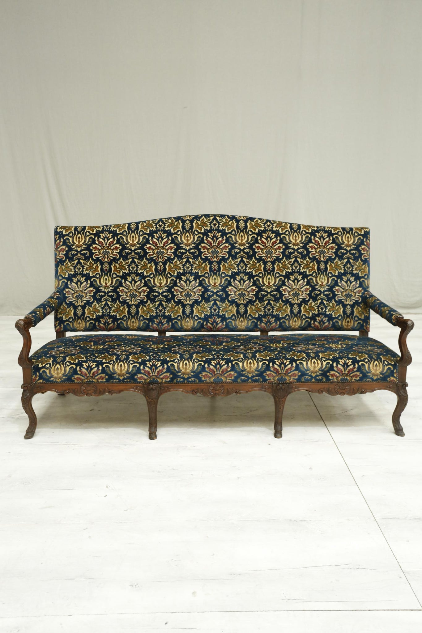 19th century French settee with carved frame
