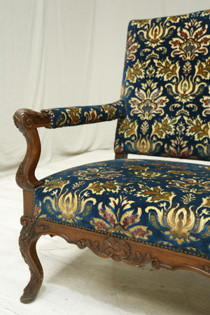 19th century French settee with carved frame