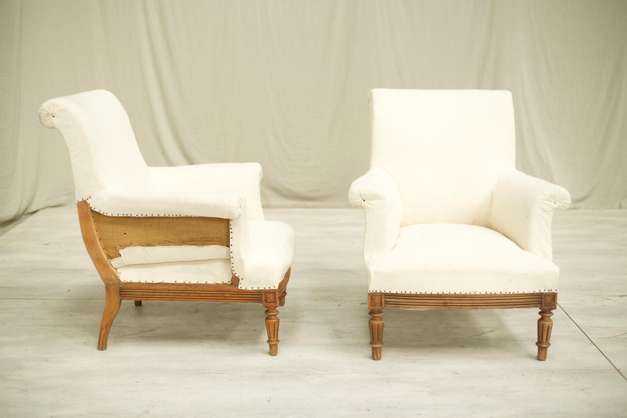 Antique Pair of early 20th century French scroll back armchairs