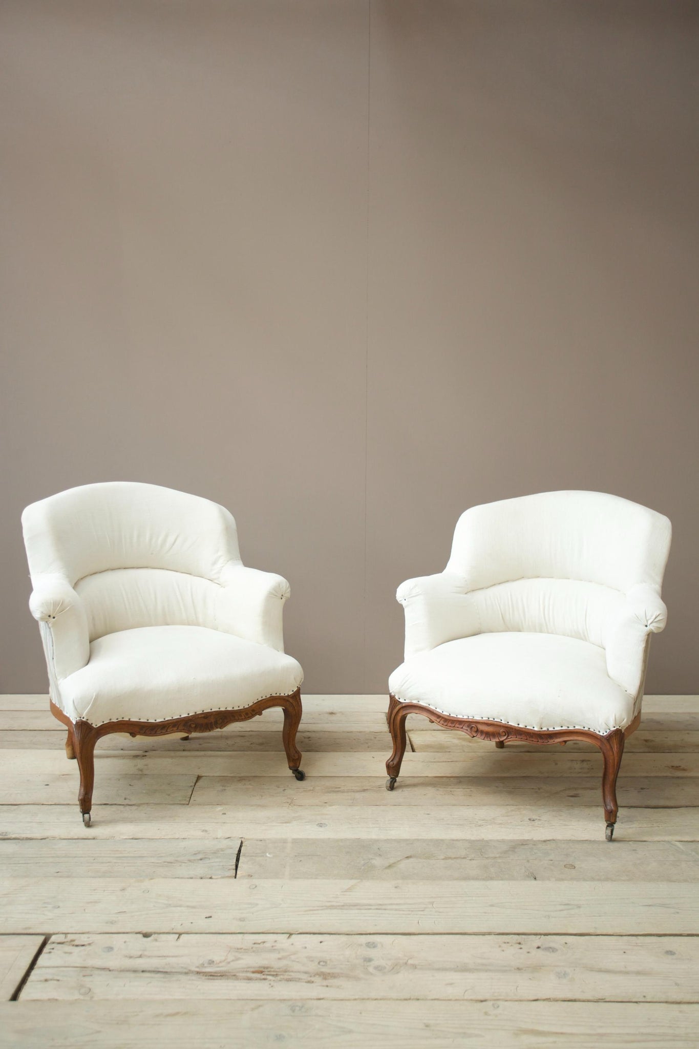Pair of 19th century French shield back armchairs with carved frame