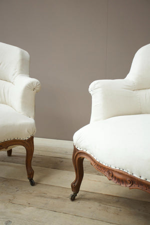 Pair of 19th century French shield back armchairs with carved frame