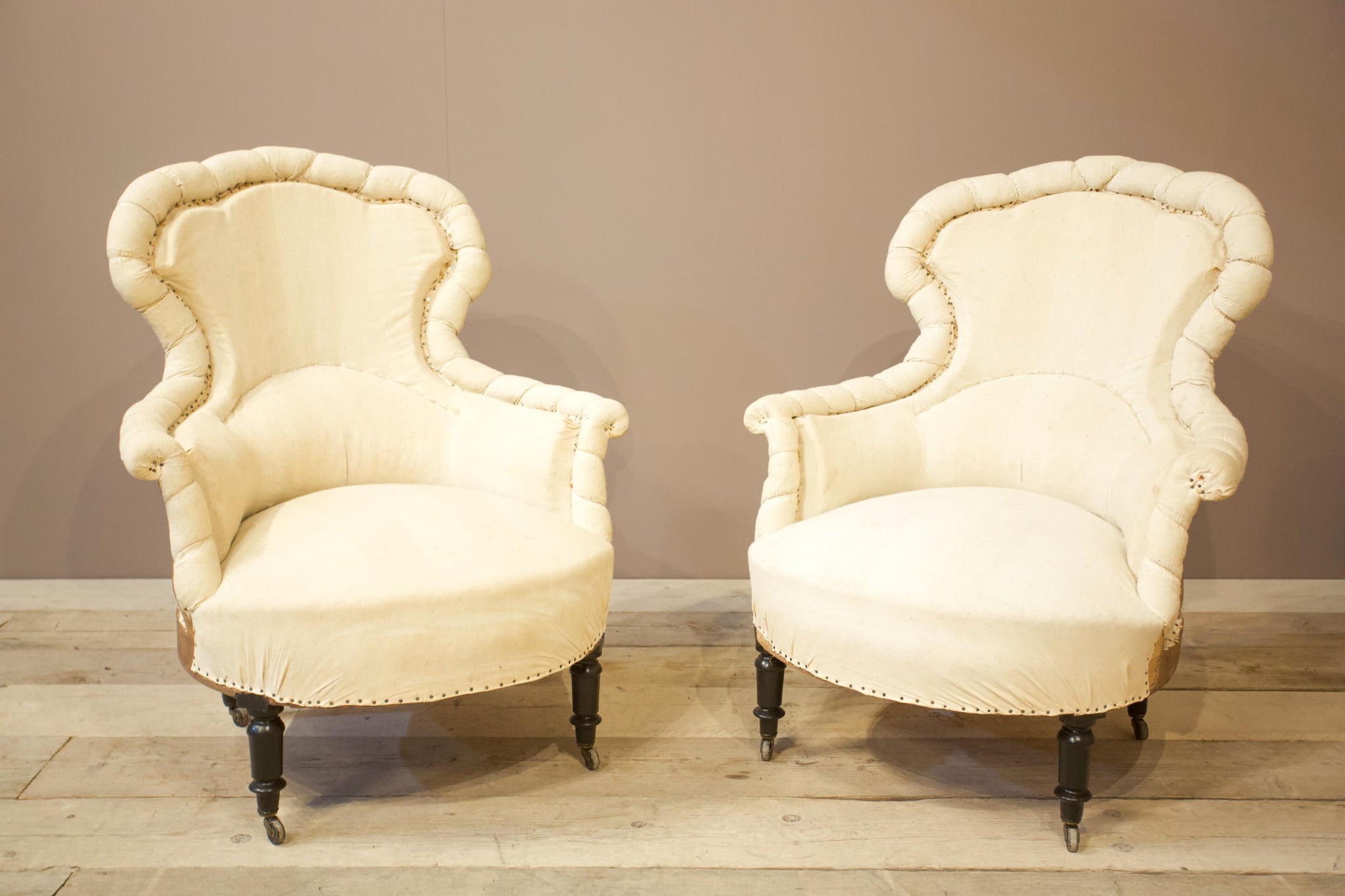 Pair of Napoleon III Scalloped pie crust armchairs