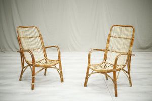 Pair of Vintage bamboo lounge chairs