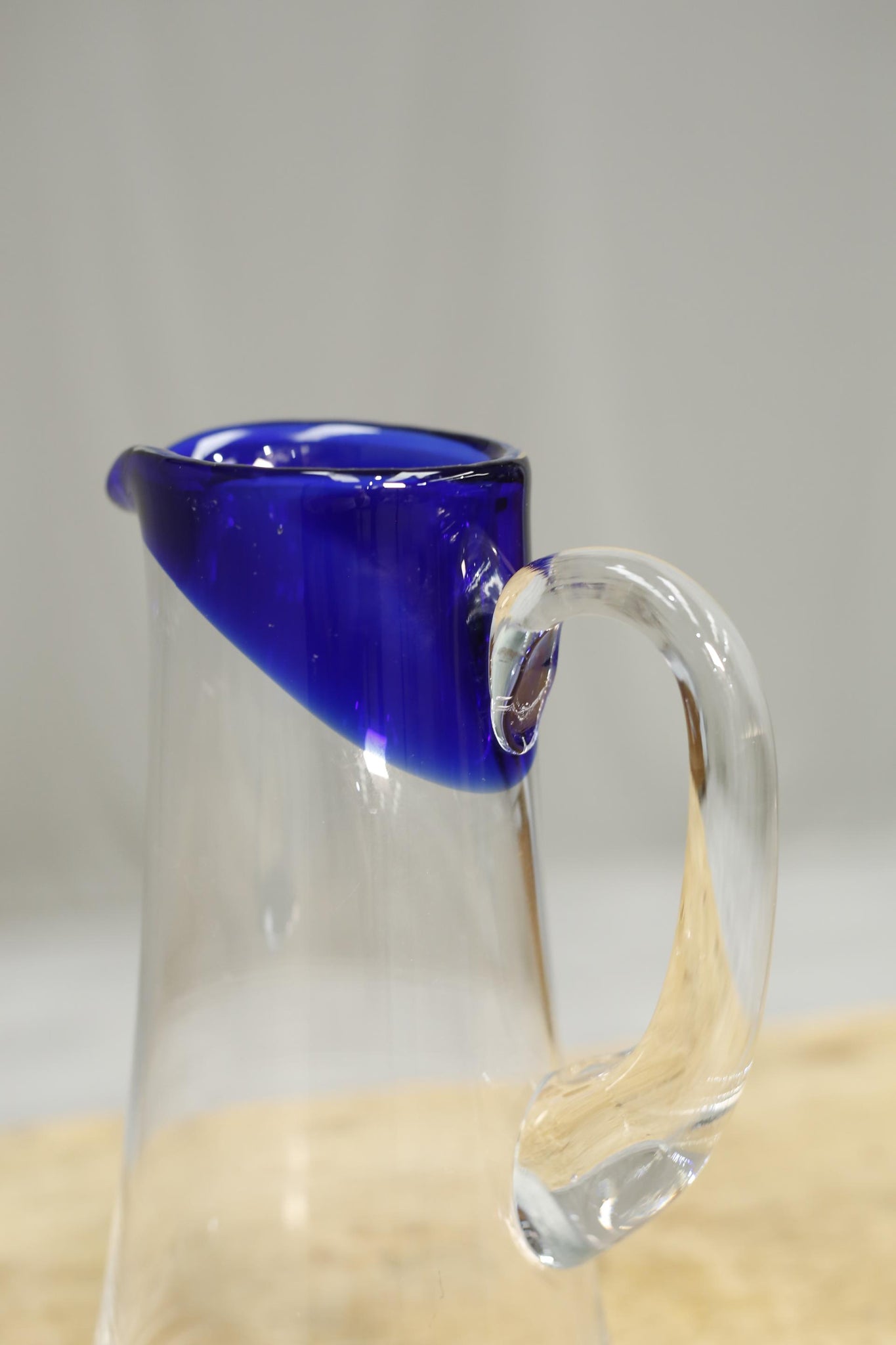 20th century clear glass jug with blue decoration