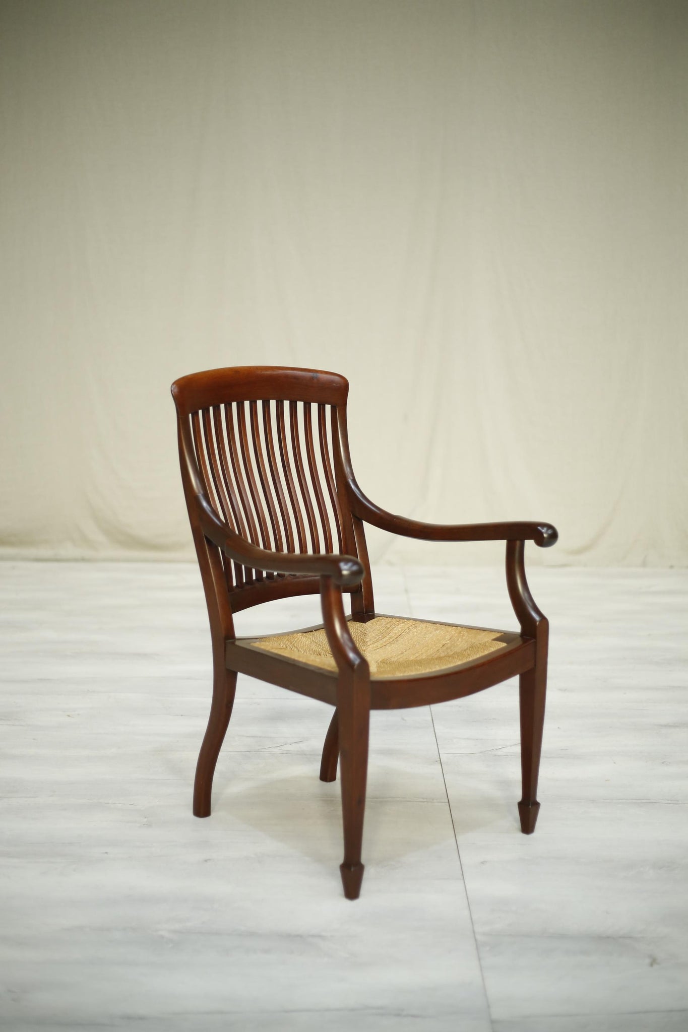 Early 20th century antique mahogany rush seated desk chair