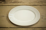 Vintage Graduated trio of white porcelain serving plates