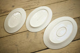 Vintage Graduated trio of white porcelain serving plates