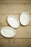 Trio of small Vintage white porcelain serving plates