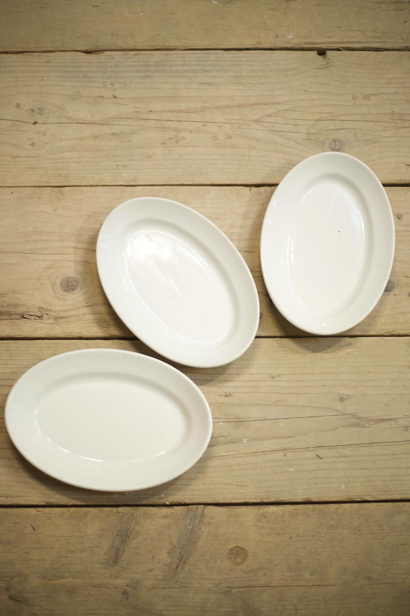 Trio of small Vintage white porcelain serving plates