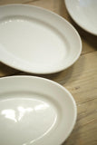 Trio of small Vintage white porcelain serving plates