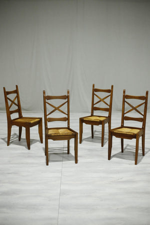 Set of 4 Guillerme et Chambron oak and rush seated dining chairs