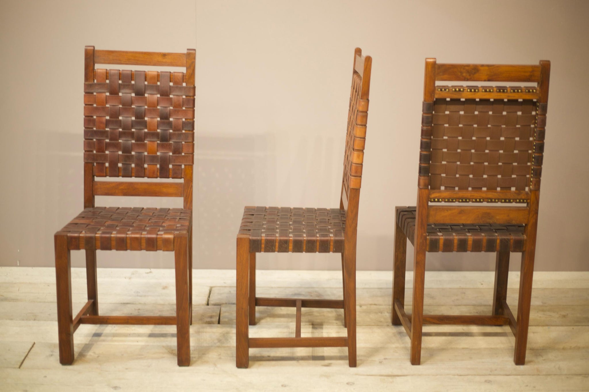 Set of 8 mid century teak and leather dining chairs