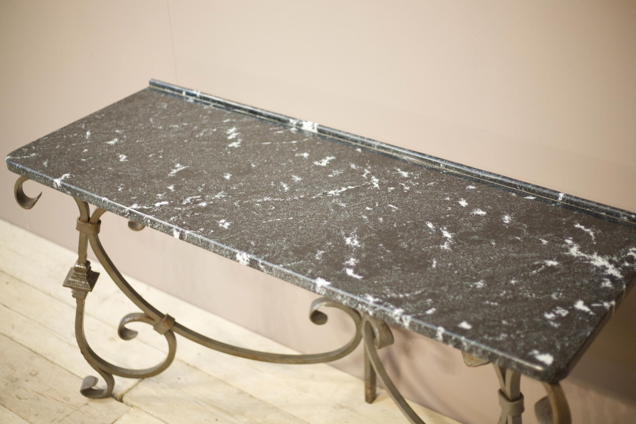 20th century iron and black marble console table