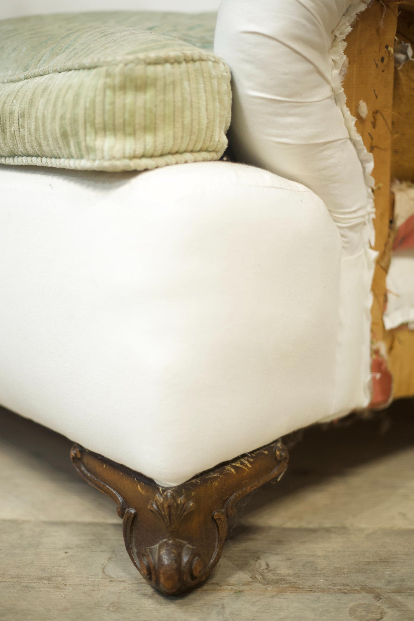 Antique English country house armchair in Howard and sons style