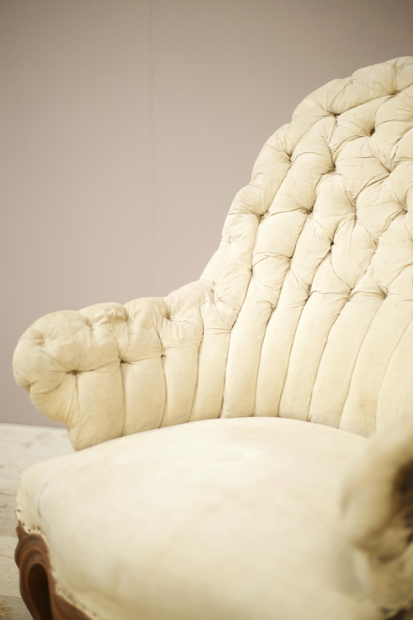 19th century French buttoned iron back armchair