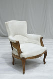 19th century French curved armchair with footstool