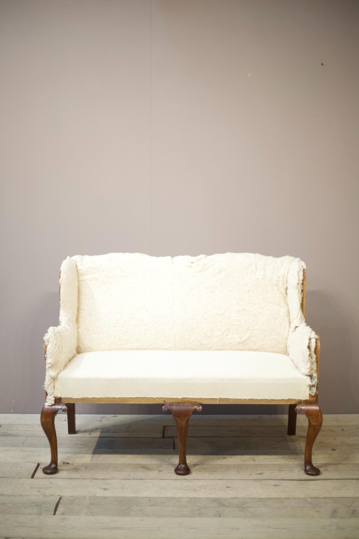 English Georgian settee with large cabriole legs