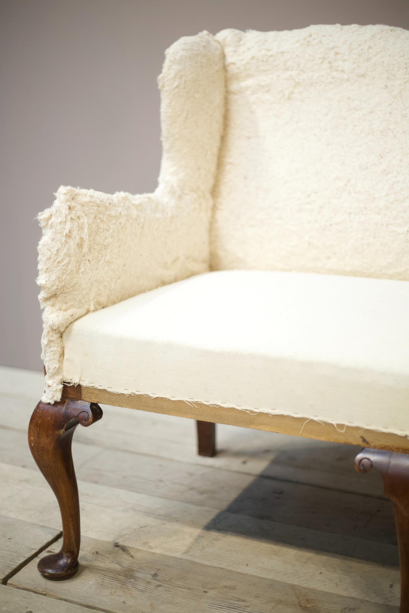 English Georgian settee with large cabriole legs