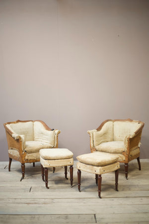 19th century French armchairs with matching stools