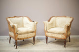 19th century French armchairs with matching stools