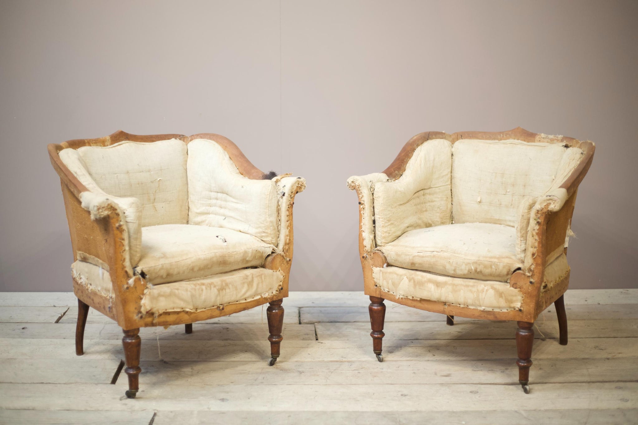 19th century French armchairs with matching stools