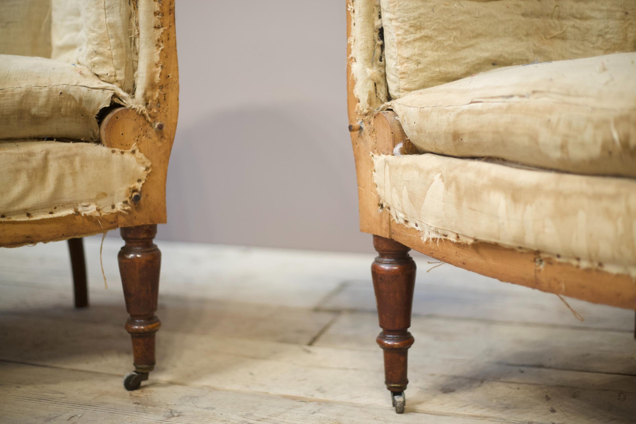 19th century French armchairs with matching stools