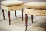 19th century French armchairs with matching stools