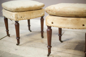 19th century French armchairs with matching stools