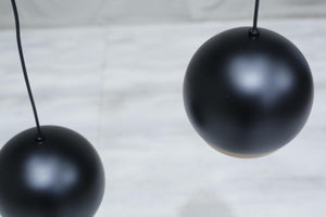 Italian black metal and beech Globe lights