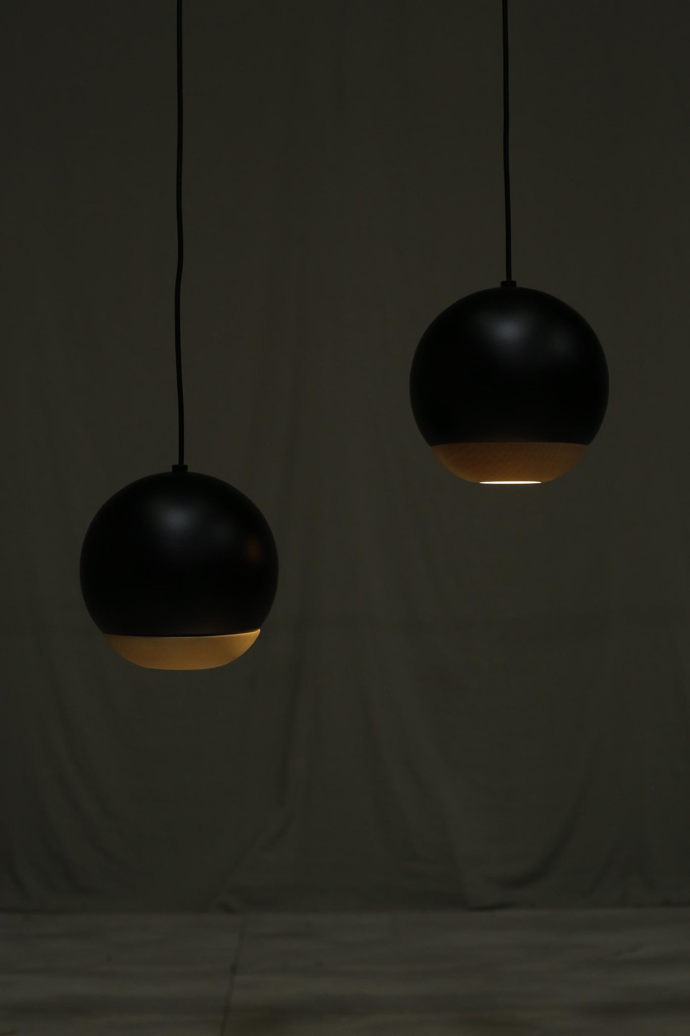 Italian black metal and beech Globe lights