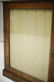 Antique Georgian mahogany glazed cabinet with material doors