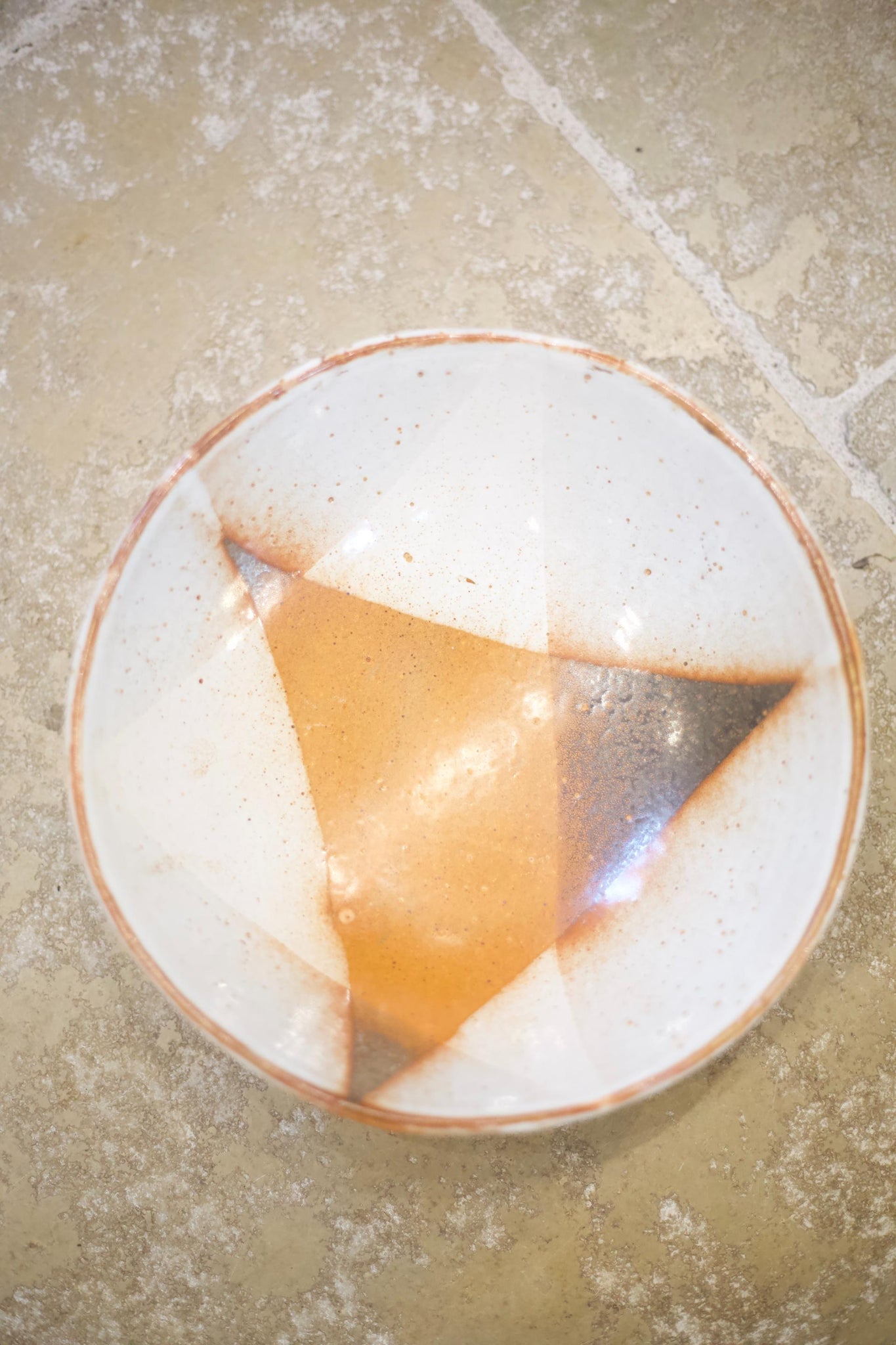 Vintage studio pottery bowl with brown decoration