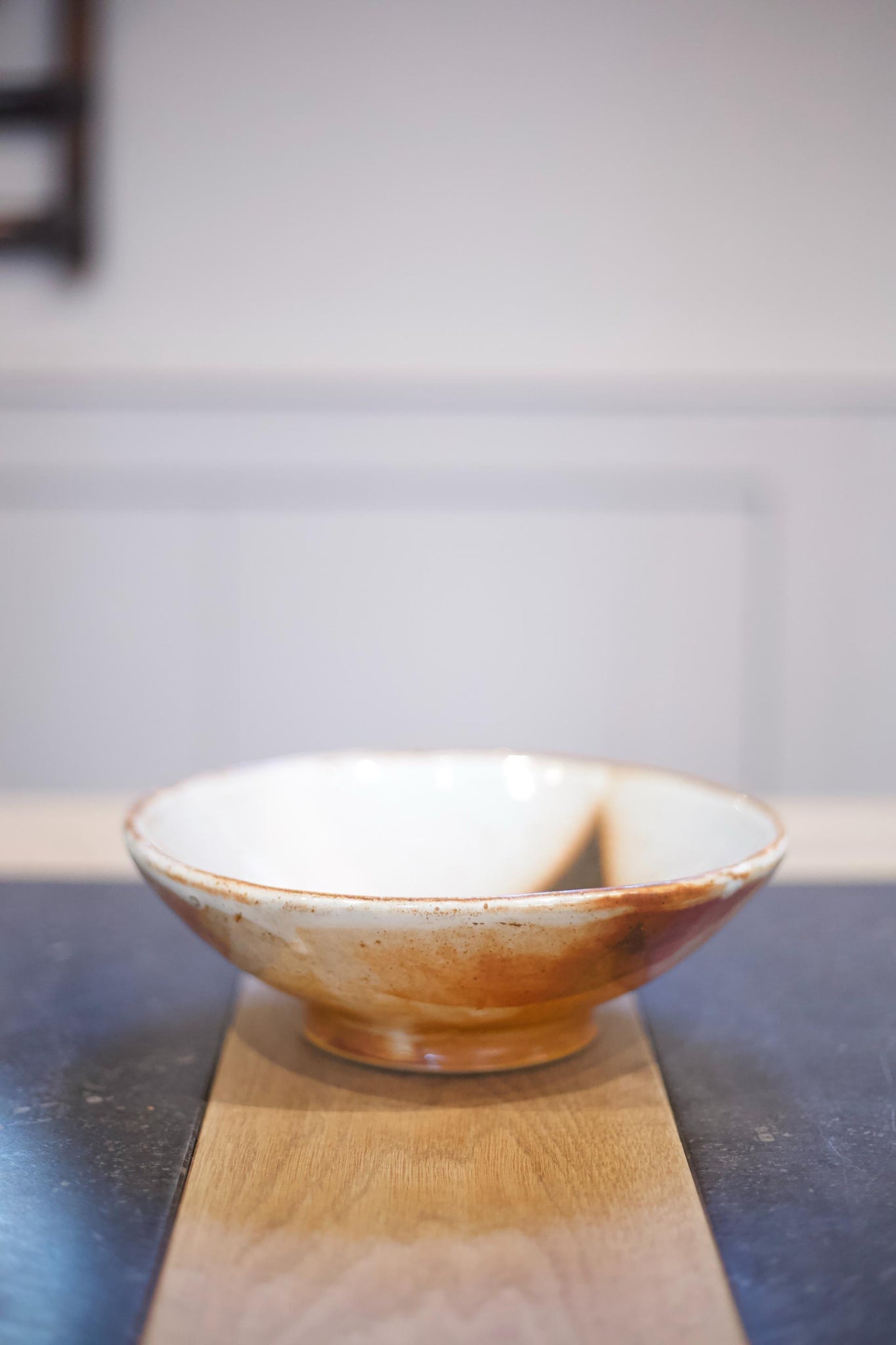 Vintage studio pottery bowl with brown decoration