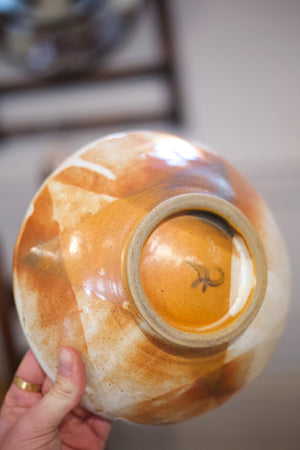 Vintage studio pottery bowl with brown decoration