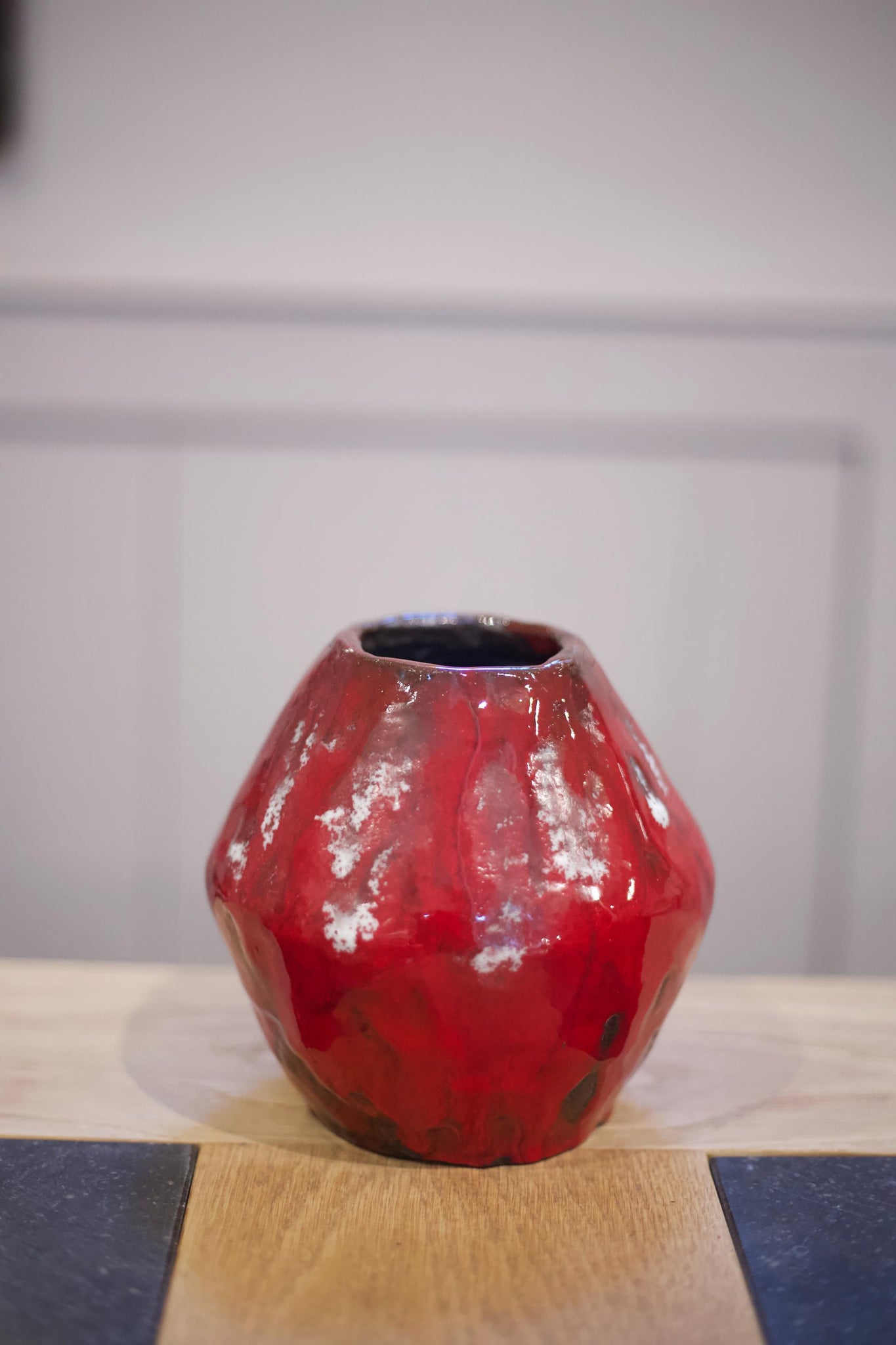 Thick red glazed studio pottery vase