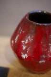 Thick red glazed studio pottery vase