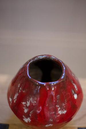 Thick red glazed studio pottery vase