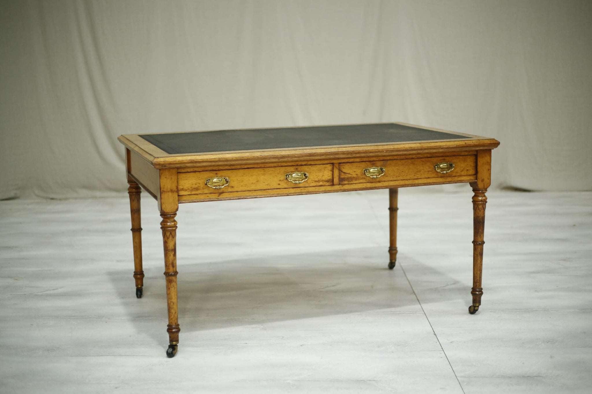 Antique Aesthetic movement oak leather topped desk by D&H Waddington