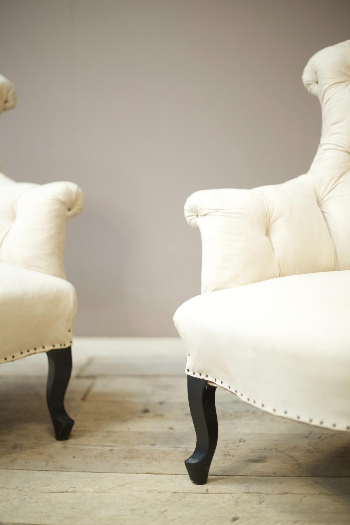 Pair of Napoleon III buttoned fishtail armchairs - TallBoy Interiors