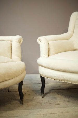 Pair of Napoleon III scroll back pie crust armchairs