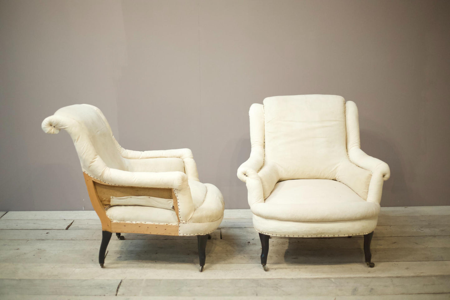 Pair of Napoleon III scroll back pie crust armchairs