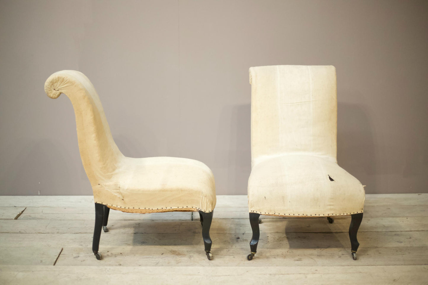 Pair of Napoleon III scroll back nursing chairs