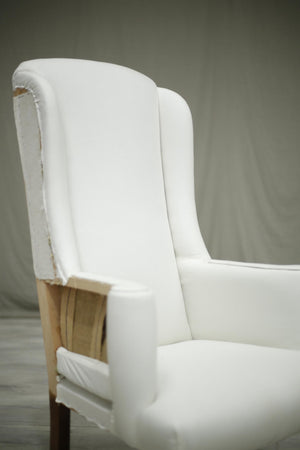 20th century high backed armchair No1